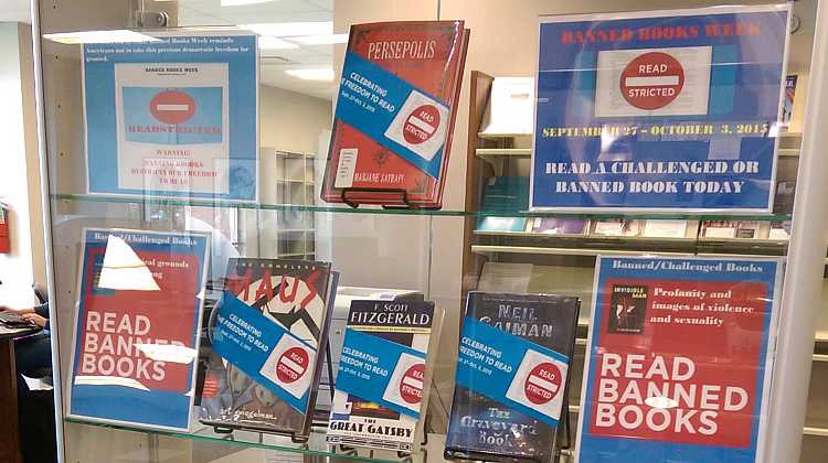 Library Banned Books Week display: Persepolis, Maus, The Great Gatsby, The Graveyard Book